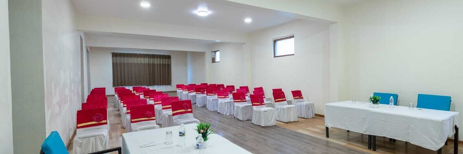 A shot of conference room with rows of chairs set up for a meeting or presentation  | DLS Serenity Resort and Spa